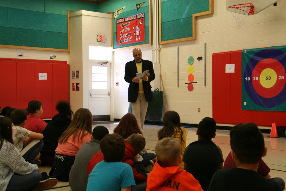 Richard Cooper reading at Ranson Elementary School