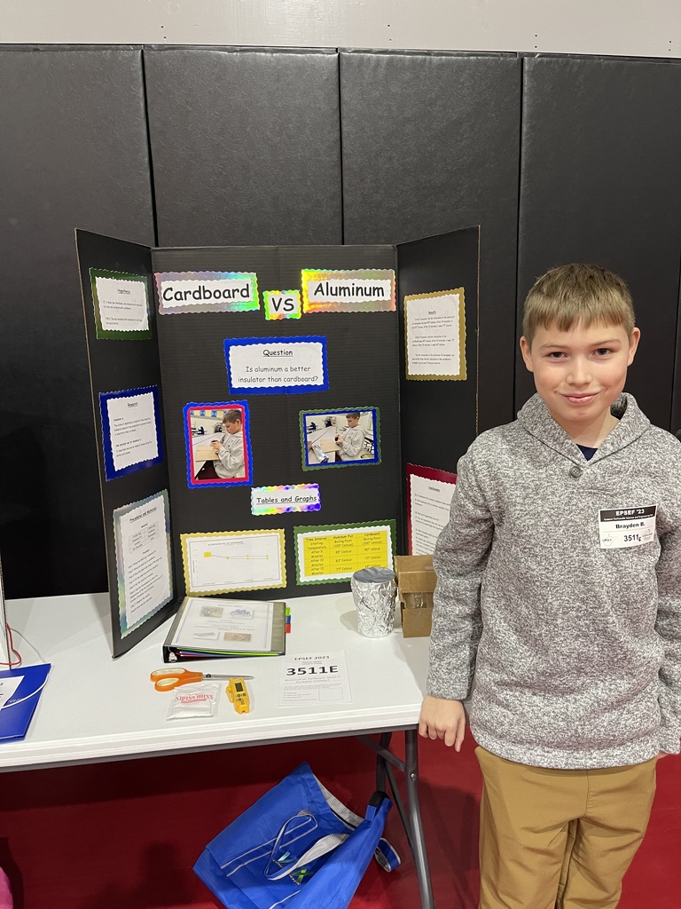 Student with science fair project