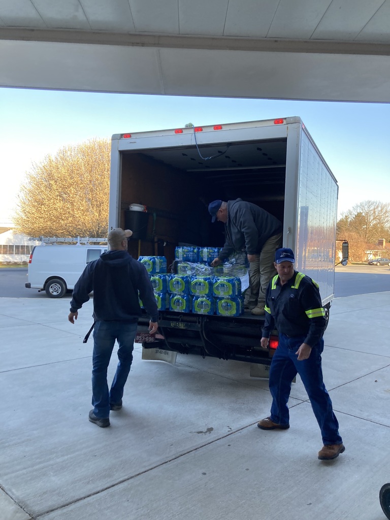 unloading water from truck