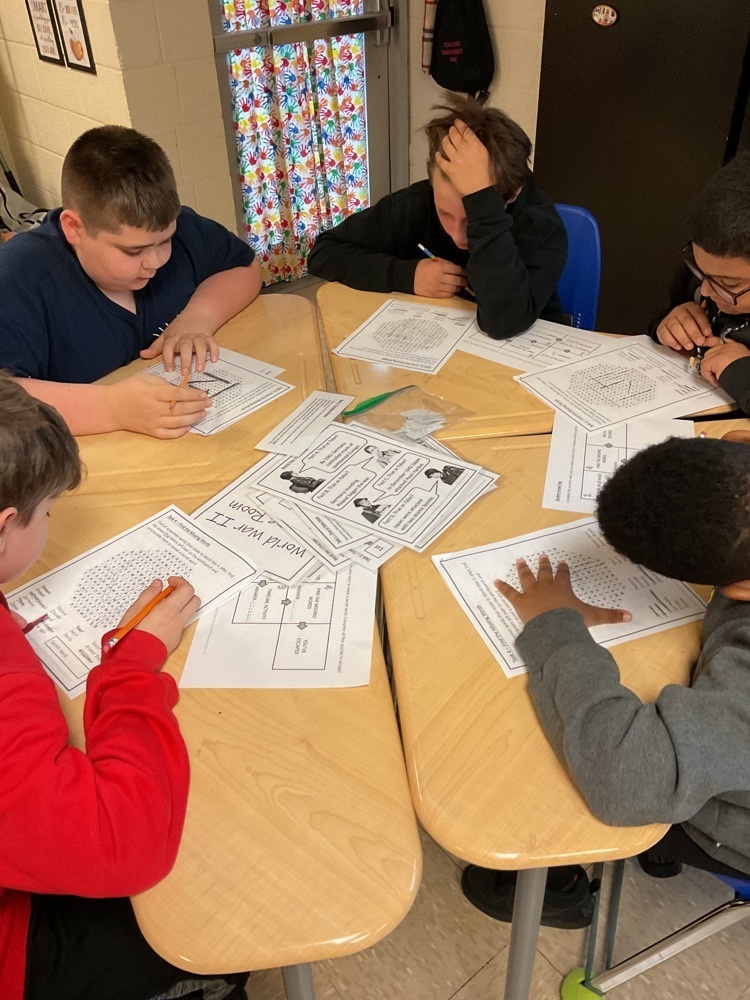 student solving puzzle