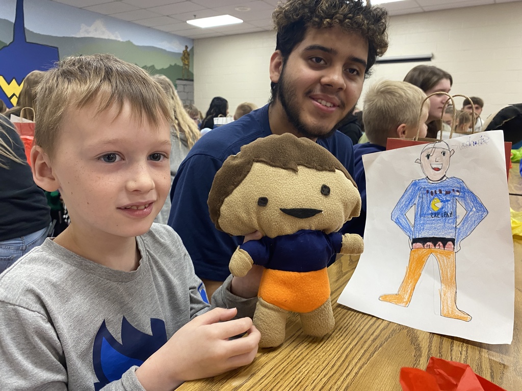 Students with doll