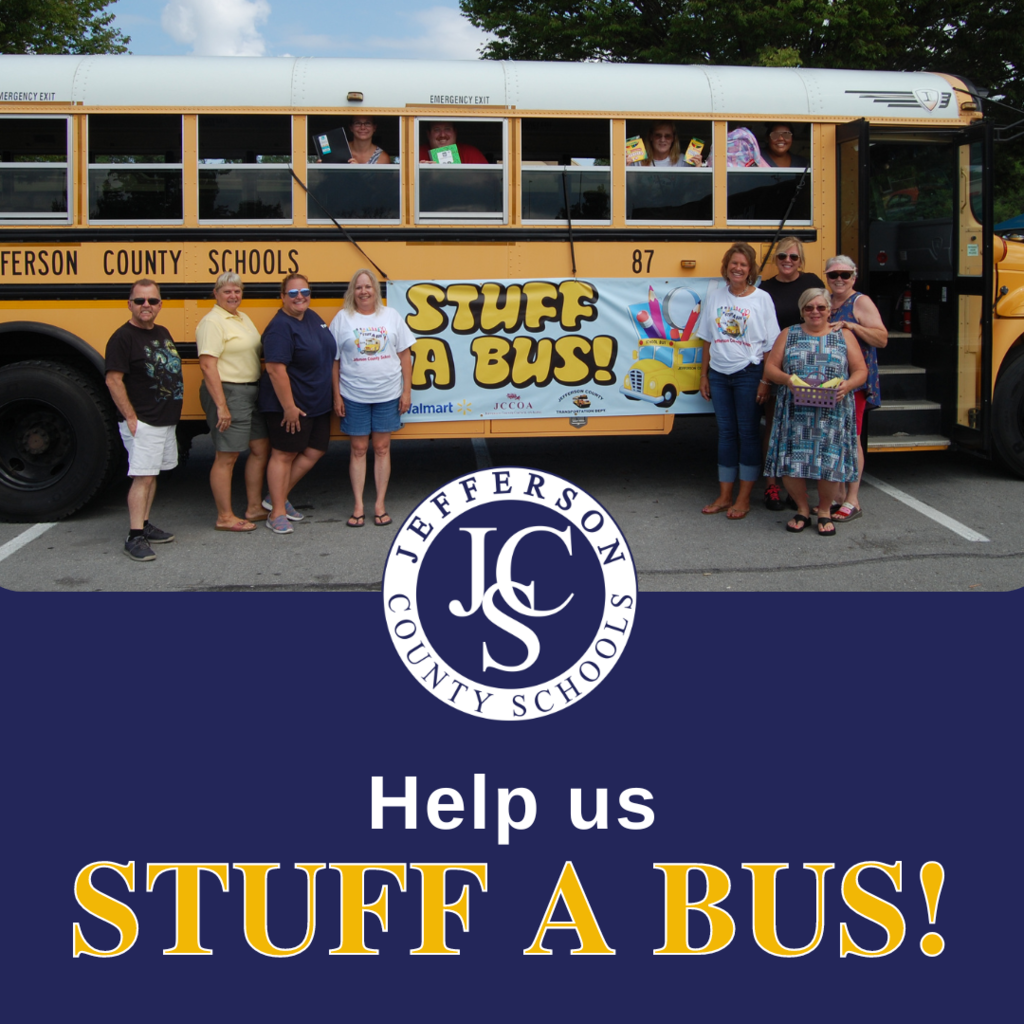 "Help us Stuff a Bus" message with image of JCS bus drivers in front of school bus with Stuff-a-Bus banner
