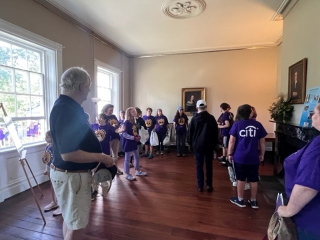 students touring large room