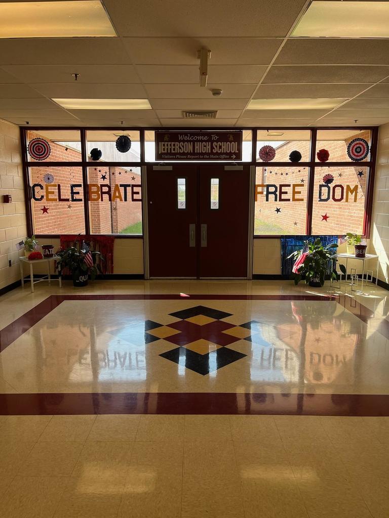 Jefferson High School windows decorated with "Celebrate Freedom" banners