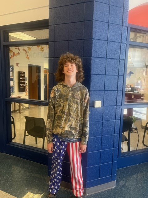 Male student dressed in American flag pants