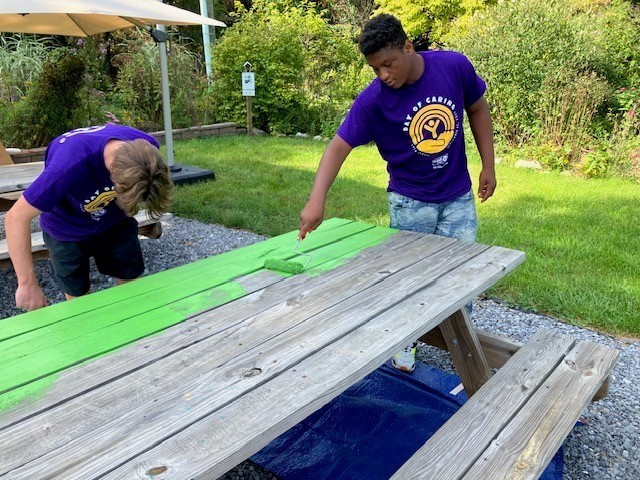 Students painting table