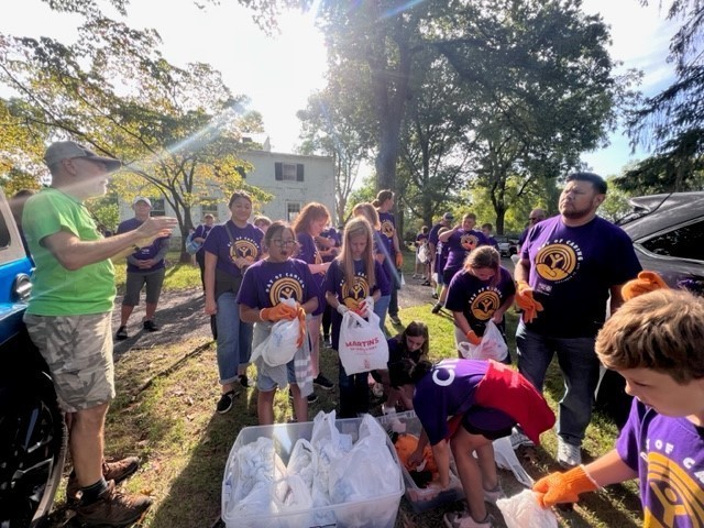 students gathering supplies